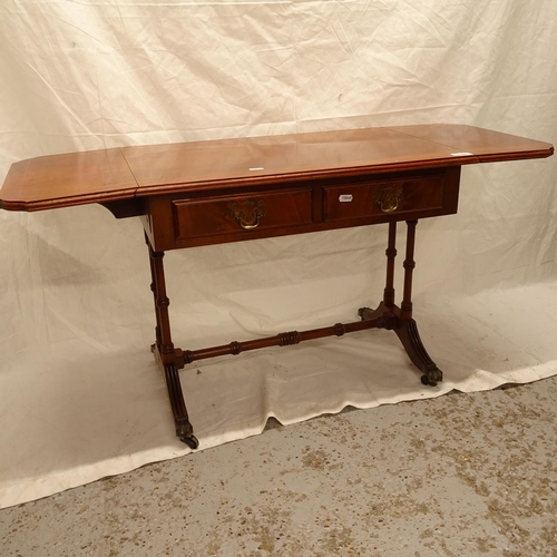 2506 - A small reproduction mahogany sofa table, with single drawer, W62cm