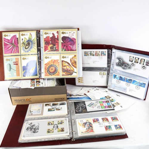 200 - A box of First Day Covers, and 3 albums First Day Covers and postcards