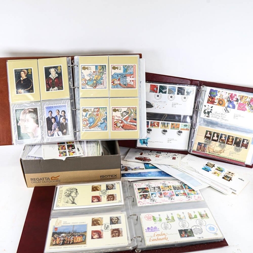 200 - A box of First Day Covers, and 3 albums First Day Covers and postcards