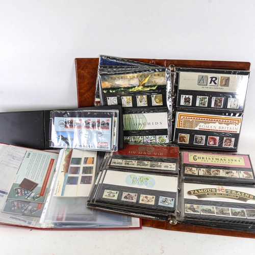 211 - 4 albums of British First Day Covers and Mint stamps