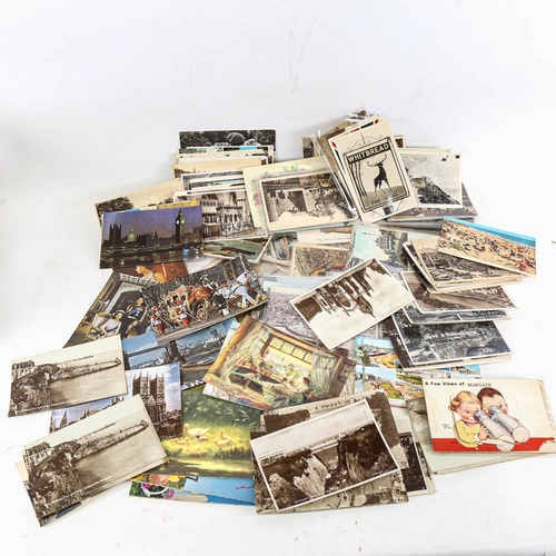 214 - A collection of early 20th century postcards