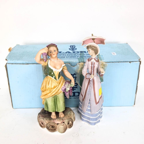 493 - Lladro lady with a parasol, 26cm, boxed, and a porcelain figure with Derby mark