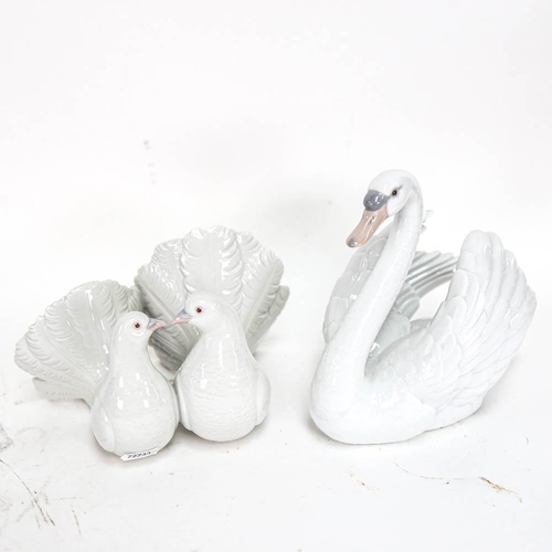 501 - Lladro porcelain swan, height 18cm, and a pair of Lladro doves