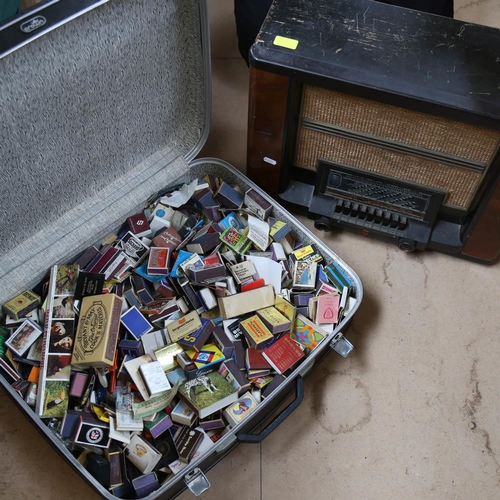 514 - A case full of matchbox covers, and a walnut-cased Philips valve radio, length 52cm