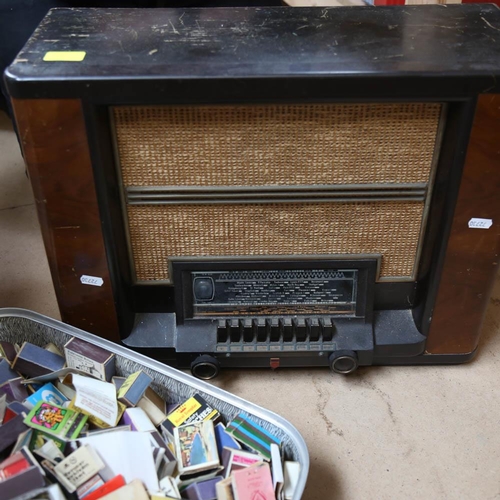 514 - A case full of matchbox covers, and a walnut-cased Philips valve radio, length 52cm