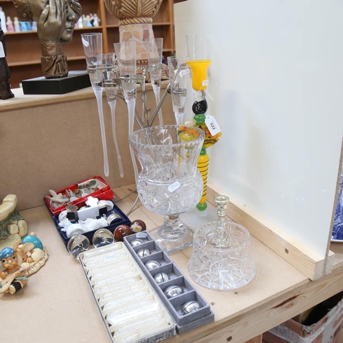 522 - 6 Champagne flutes in a plated stand, height 45cm, candles, vase and bowl etc.