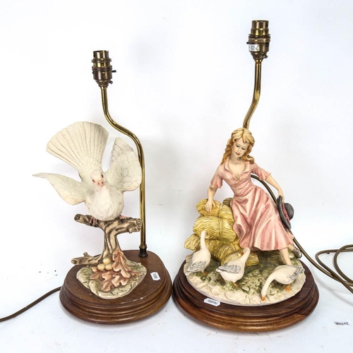 544 - 2 table lamps supported by Capodimonte figures - girl with geese, and a white dove, height 39cm over... 