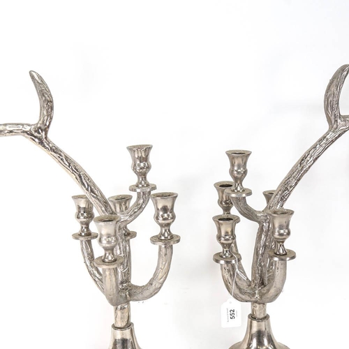 552 - A pair of plated antler design candelabra, height 63cm