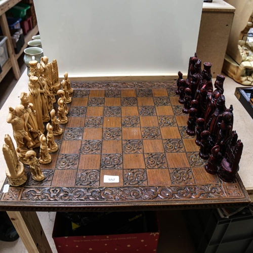 557 - A set of composition chessmen with board, King height 20cm