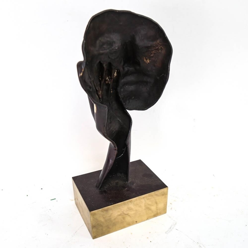 585 - A modernist patinated brass sculpture, face and hand, unsigned, overall height 40cm