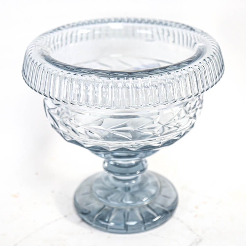 591 - An early 20th century greyish blue glass table centre pedestal bowl, with cut-star base, height 20cm... 