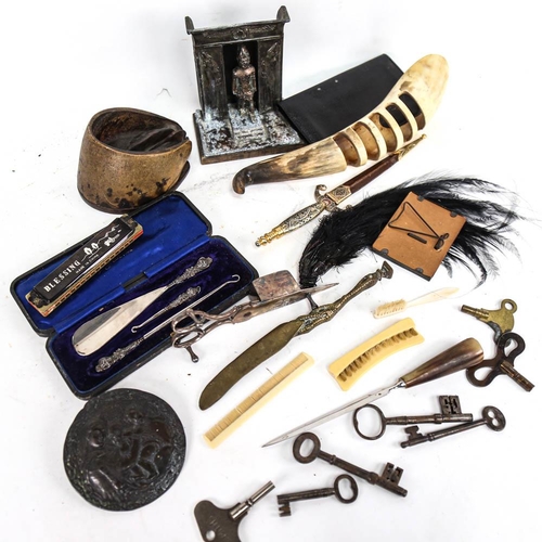 596 - Toledo paper knife, boxed, shoe horn and hooks, horse hoof, and other interesting items