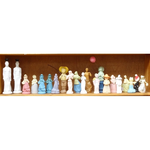 614 - A collection of Avon figurine perfume bottles, tallest 27.5cm