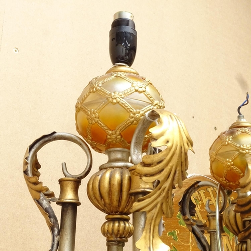 639 - A pair of silvered and gold painted Renaissance style table lamps, height excluding fitting 60cm