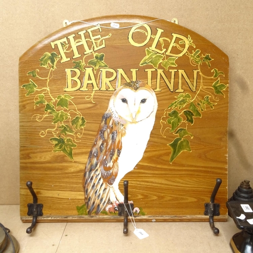 640 - Wooden panel with painted design of a barn owl, and 3 coat hooks, height 60cm