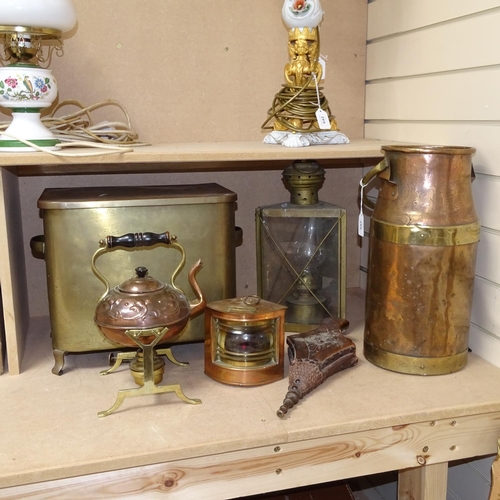 643 - A brass coal bin, a copper and brass churn, height 41cm, 2 lamps, bellows, and a spirit kettle