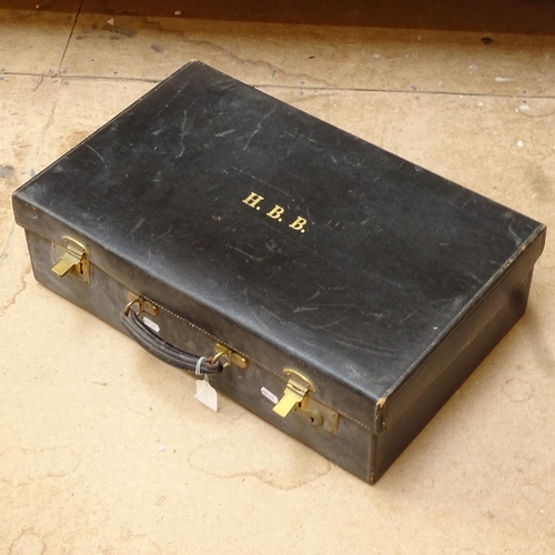 653 - Vintage suitcase with brass locks, length 56cm