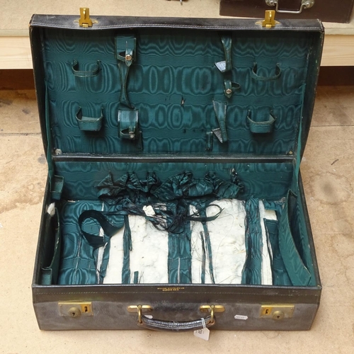 653 - Vintage suitcase with brass locks, length 56cm