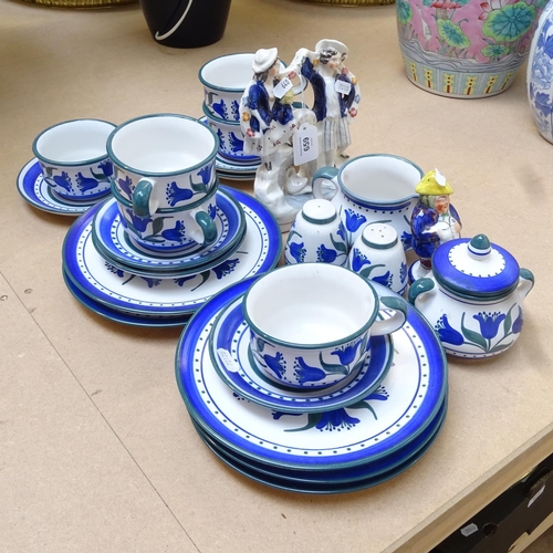 659 - A Staffordshire group, a Staffordshire desk sander, and Art pottery painted tea set