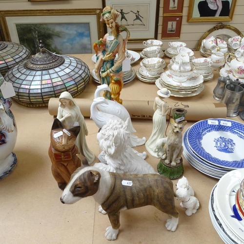 662 - Composition dogs, porcelain figures etc