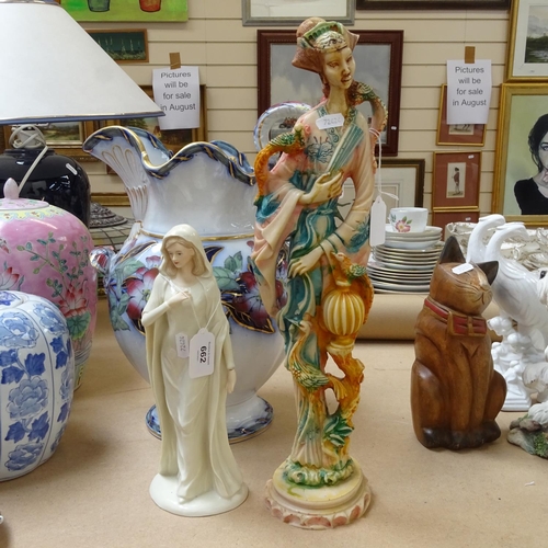 662 - Composition dogs, porcelain figures etc