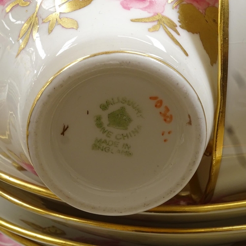 668 - A Salisbury bone china tea service for 12 people, with pink rose decoration