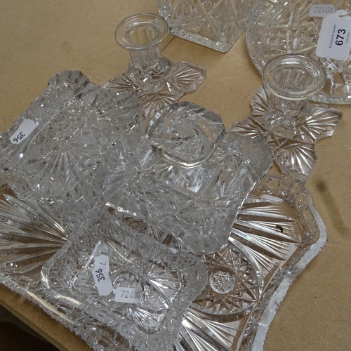 673 - 2 crystal decanters, and a dressing table set