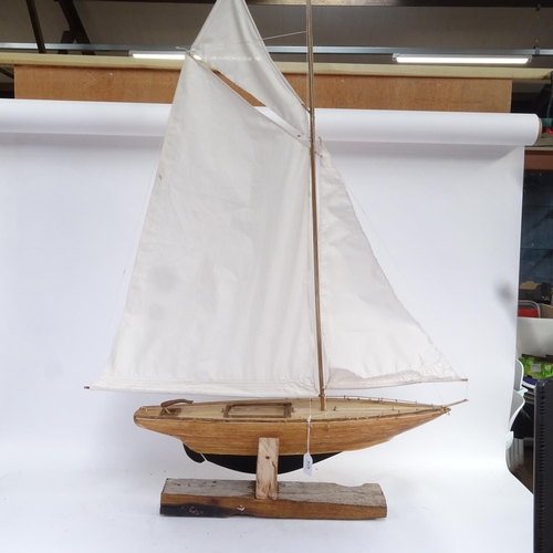 674 - A handmade model pond yacht sculpture, with masts and rigging, overall height 113cm