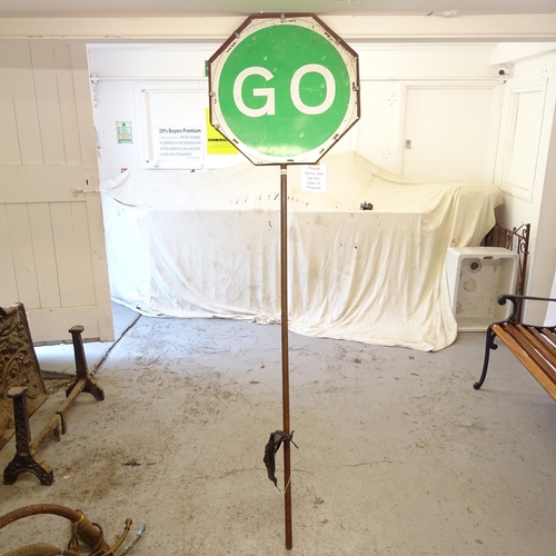 2511 - A metal framed Stop/Go road sign, Diameter 62cm, Height overall 212cm