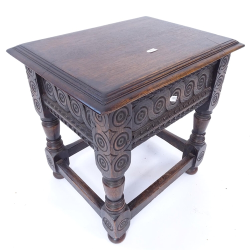 2018 - A small carved oak sewing box on turned legs, W44cm, H44cm, D31cm