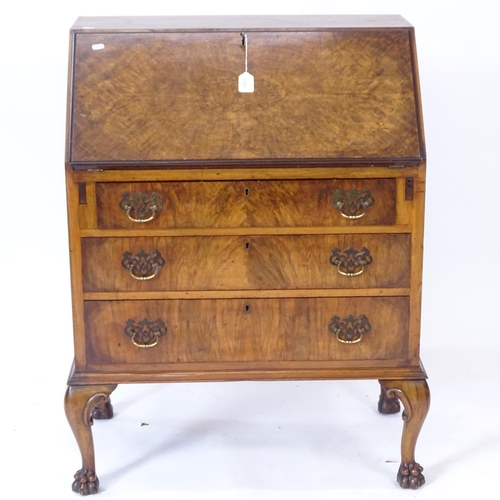 2025 - A 1930s walnut bureau with 3 graduated drawers, on cabriole legs with hoof feet, W77cm, H103cm, D48c... 