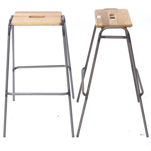 2045 - A pair of Deadgood Working Girl stools, by David Irwin, with maker's marks, stool height 78cm