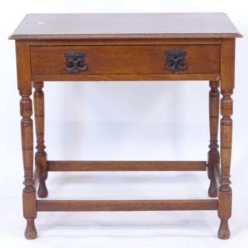 2067 - A 1920s rectangular oak side table, single frieze drawer, on turned legs, W77cm, H73cm, D50cm