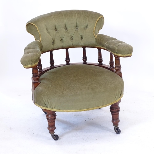 2088 - A Victorian button-back upholstered bow-arm bedroom chair, on ring turned legs