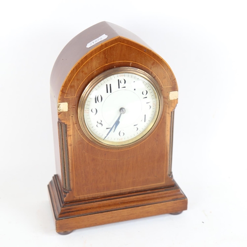 102 - An early 20th century French mahogany lancet-top mantel clock, white enamel dial with blued steel ha... 