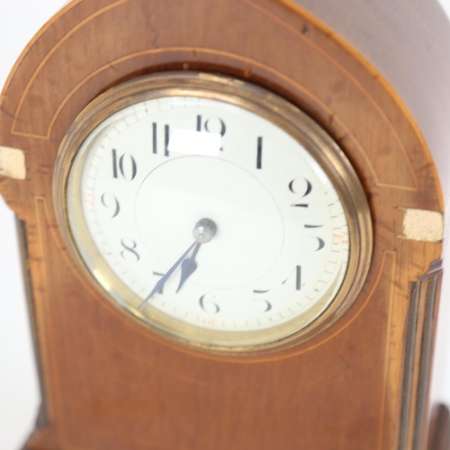 102 - An early 20th century French mahogany lancet-top mantel clock, white enamel dial with blued steel ha... 