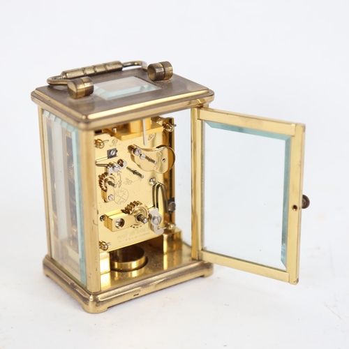 105 - A reproduction brass-cased miniature carriage clock, marked Dent of London, with subsidiary dial, ca... 