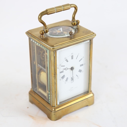 107 - A brass-cased repeating carriage clock, by Dent of London, white enamel dial with Roman numeral hour... 