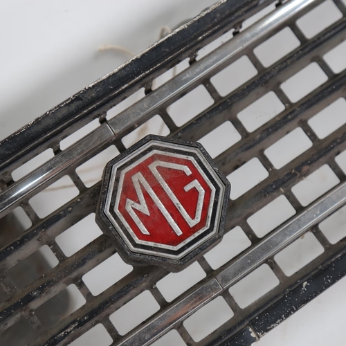 117 - A Vintage MG Classic car radiator grille, W85cm, H16cm, and a pair of MG mudflaps