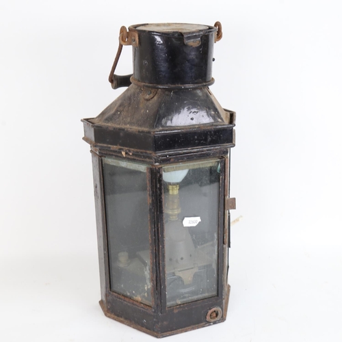 61 - A large 19th century black painted coaching lantern, converted to electric, height 40cm