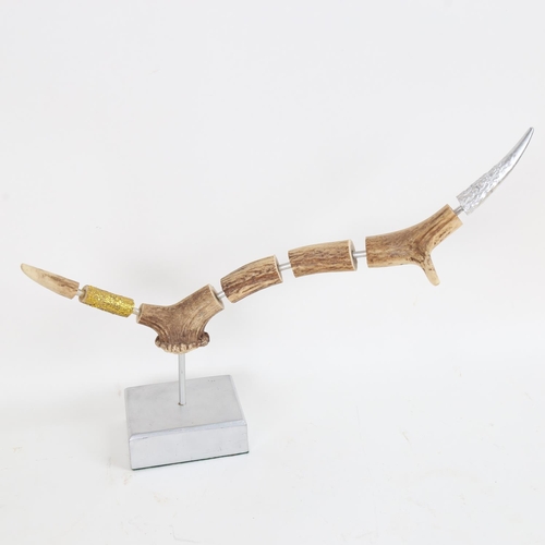 72 - Chris Watson, mixed media sculpture, antler, length approx 41cm