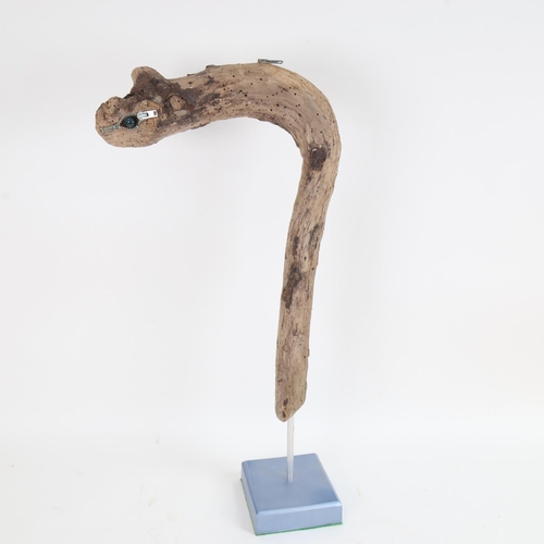 73 - Chris Watson, wood beast, wood/metal composition on metal base, height 20.5