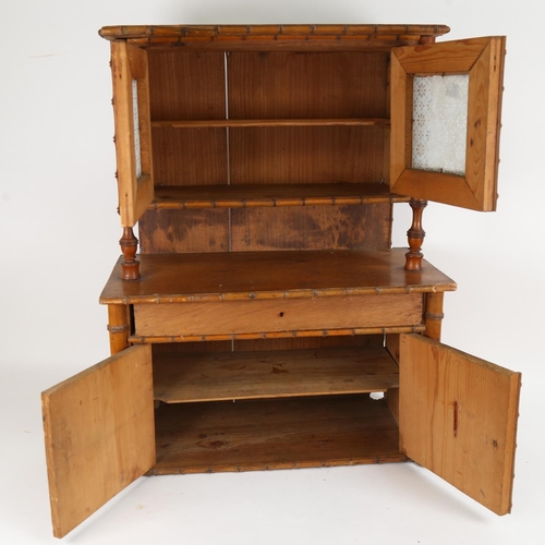 74 - A doll's pine kitchen dresser, with ring turned faux bamboo mounts, W44cm, H58cm, D21cm