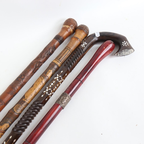 90 - 4 Oriental walking sticks, including lignum vitae and bamboo examples (4)