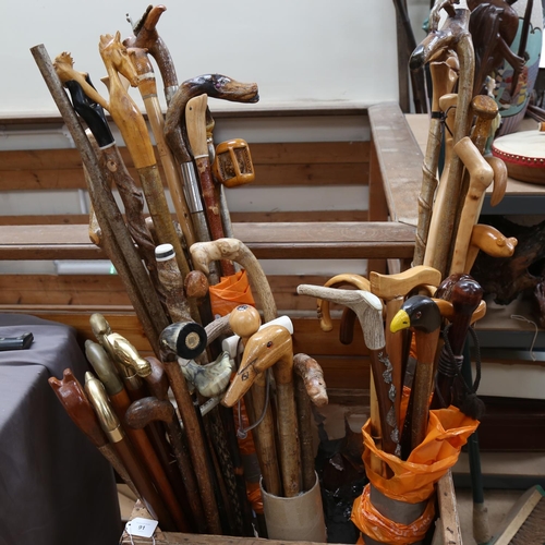 91 - A large quantity of various walking and hiking sticks and canes (51)