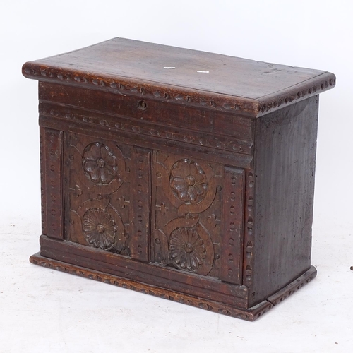 2142 - A small Antique oak box, with Tudor Rose relief carved panelled front, W59cm, H47cm, D35cm