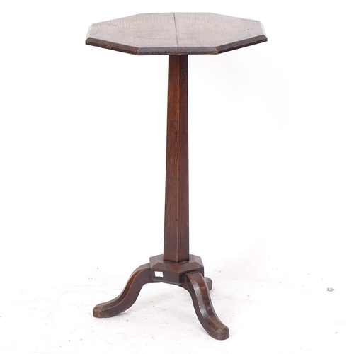 2145 - A Victorian Gothic oak tripod table, W41cm, H70cm