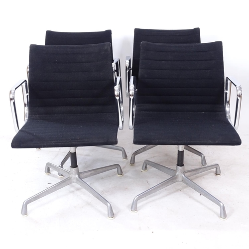 2188 - A set of 4 Charles Eames Hermann Miller EA108 aluminium group armchairs in black hopsack, with cast ... 