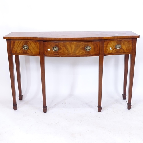 2226 - A reproduction mahogany serpentine-front server, with 3 frieze drawers, raised on 6 square tapered l... 