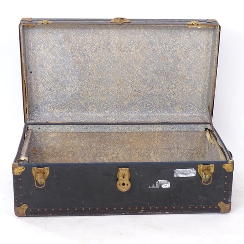 2231 - An early 20th century studded and bound ship's trunk, W91cm